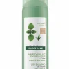 Shampoing sec purifiant teinté pour cheveux bruns